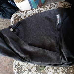 Swiss+Gear charcoal gray sling bag 17x10x 5 1/2 inches. 2 front zippers, 1 back